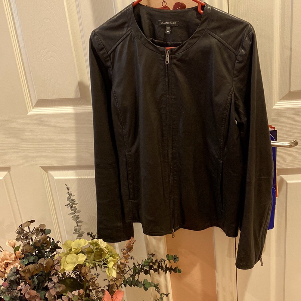 Black leather jacket.  Light weight by Eileen Fisher.  XS thou fits like S/M.